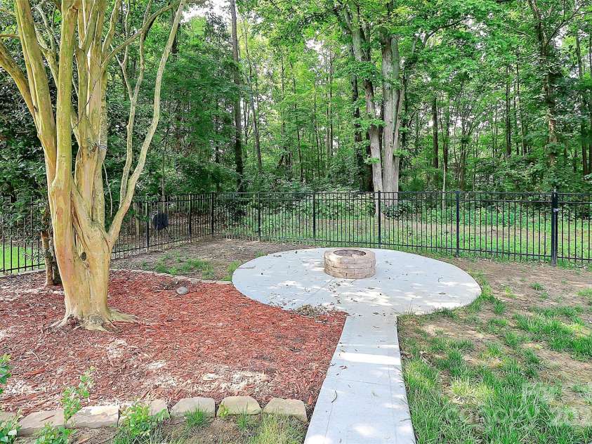 14904 Rosemary Way Drive, Huntersville, NC 28078.  MLS# CAR4266455, YatesRealty ID 20172. Walkway leading to firepit