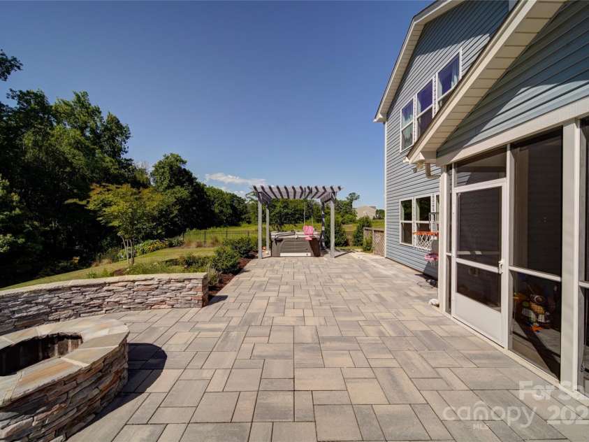 2035 Beacon Avenue, Monroe, NC 28110.  MLS# CAR4265036, YatesRealty ID 20173. Fire pit with lots of seating space