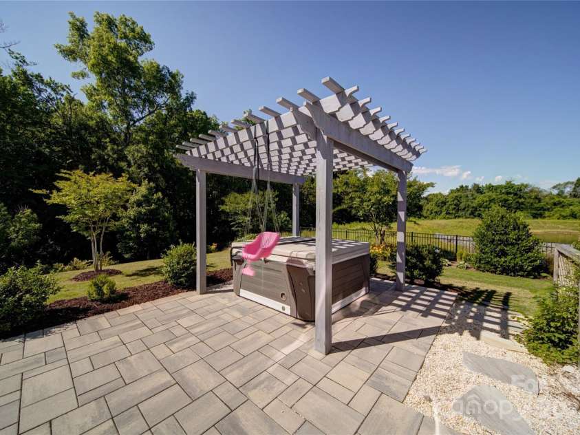 2035 Beacon Avenue, Monroe, NC 28110.  MLS# CAR4265036, YatesRealty ID 20173. Pergola with hot tub