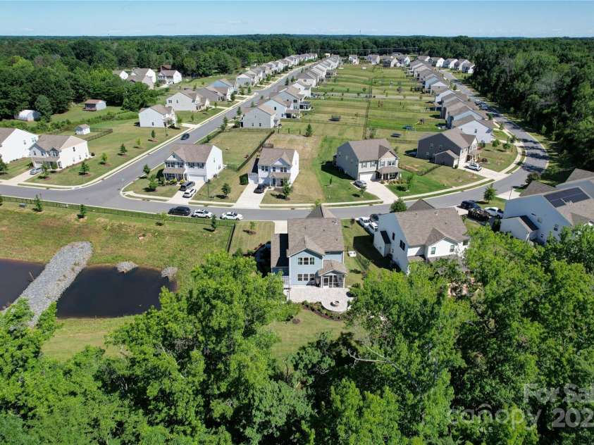 2035 Beacon Avenue, Monroe, NC 28110.  MLS# CAR4265036, YatesRealty ID 20173. Private wooded backyard