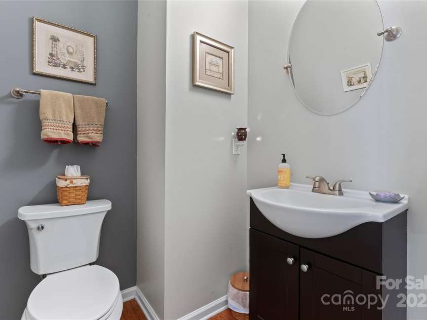 107 Glenmont Court, Mooresville, NC 28117.  MLS# CAR4267304, YatesRealty ID 20176. Half bathroom on main level