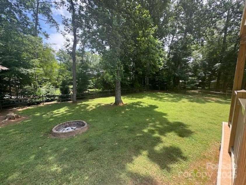 107 Glenmont Court, Mooresville, NC 28117.  MLS# CAR4267304, YatesRealty ID 20176. Private backyard