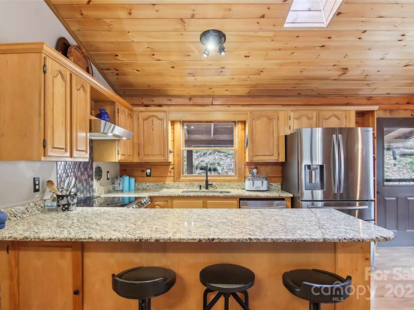 680 Creekside Drive, Maggie Valley, NC 28751.  MLS# CAR4232655, YatesRealty ID 20184. 