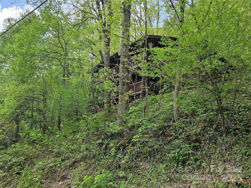 680 Creekside Drive, Maggie Valley, NC 28751.  MLS# CAR4232655, YatesRealty ID 20184. 