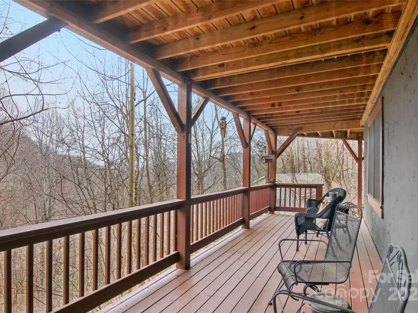680 Creekside Drive, Maggie Valley, NC 28751.  MLS# CAR4232655, YatesRealty ID 20184. Lower level deck