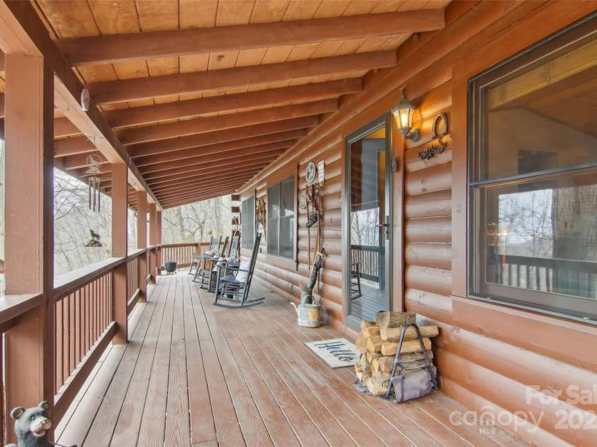 680 Creekside Drive, Maggie Valley, NC 28751.  MLS# CAR4232655, YatesRealty ID 20184. Main floor deck