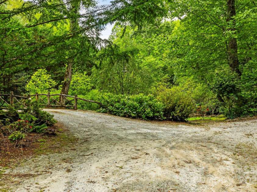3739 Pickens Highway, Rosman, NC 28772.  MLS# CAR4262778, YatesRealty ID 20189. Nice gravel driveways leading to house sites on the property!