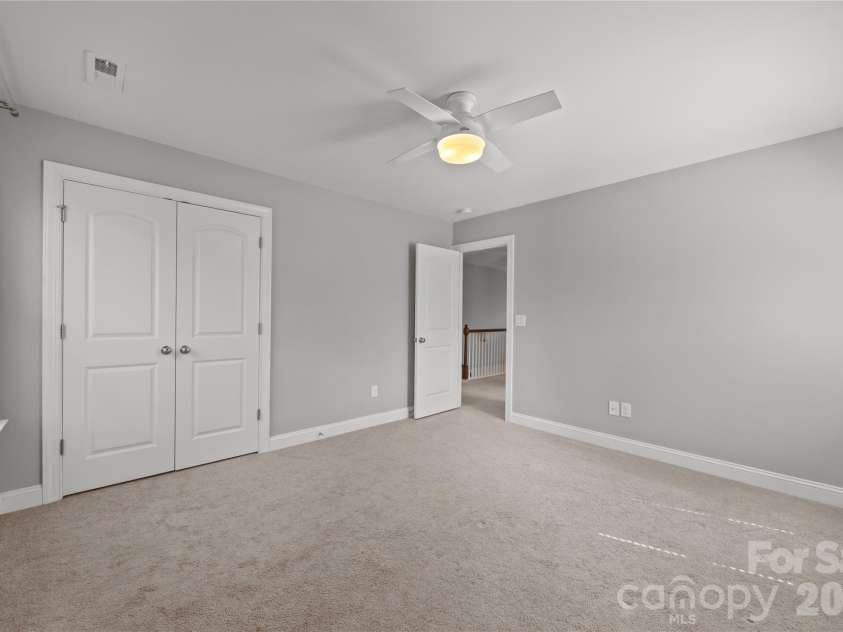 921 Rock Forest Way, Fort Mill, SC 29707.  MLS# CAR4359119, YatesRealty ID 20189. Bedroom 2