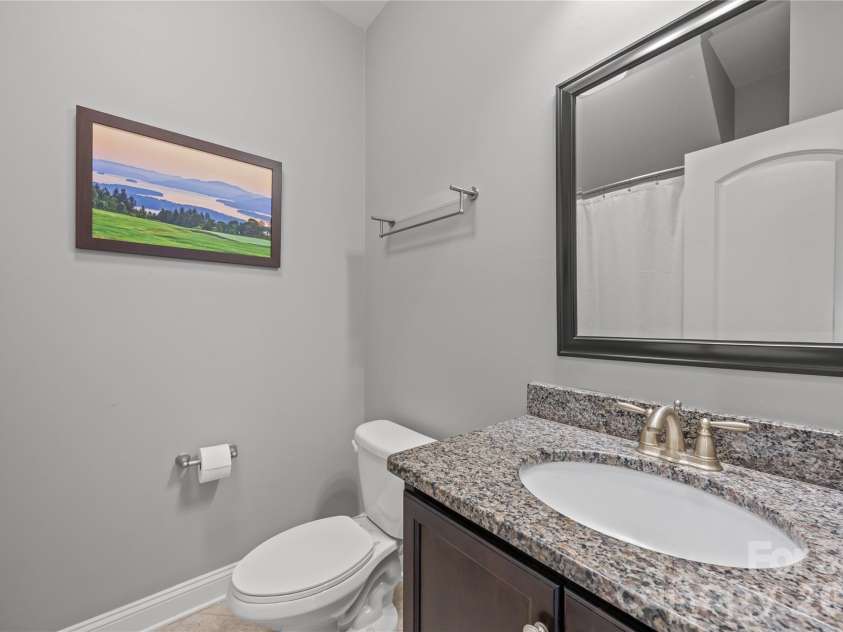 921 Rock Forest Way, Fort Mill, SC 29707.  MLS# CAR4359119, YatesRealty ID 20189. Main level full bath
