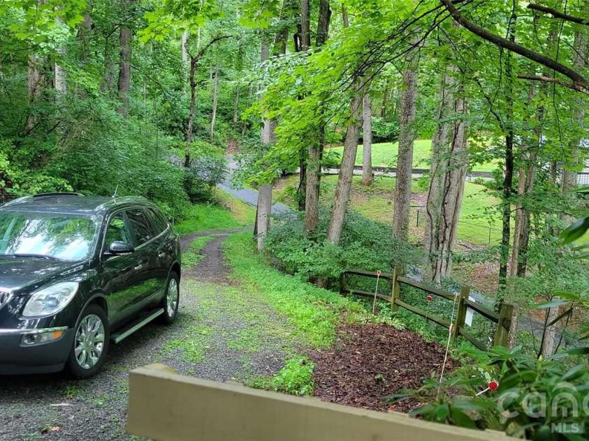 445 Allison Drive, Maggie Valley, NC 28751.  MLS# CAR4346332, YatesRealty ID 2020. All paved access except gravel driveway