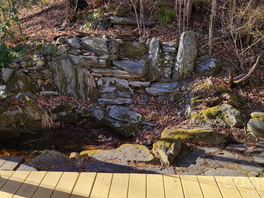 445 Allison Drive, Maggie Valley, NC 28751.  MLS# CAR4346332, YatesRealty ID 2020. Artificial Waterfall