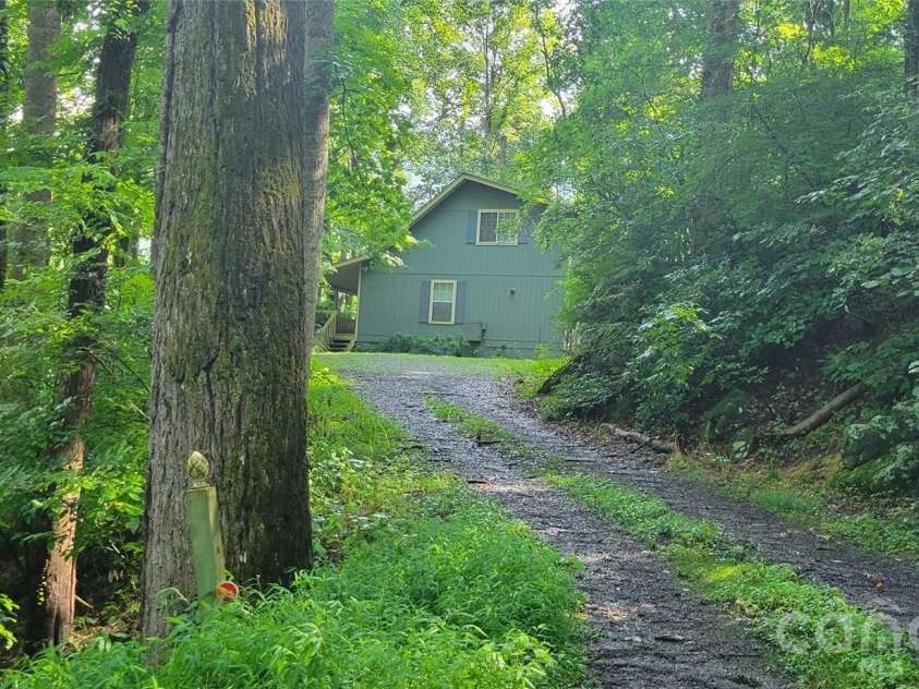445 Allison Drive, Maggie Valley, NC 28751.  MLS# CAR4346332, YatesRealty ID 2020. Driveway entry off paved Allison Drive