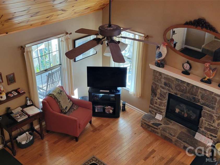 445 Allison Drive, Maggie Valley, NC 28751.  MLS# CAR4346332, YatesRealty ID 2020. Gas logs in rock FP