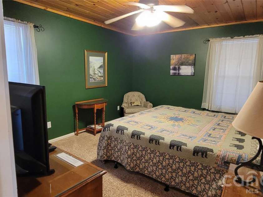 445 Allison Drive, Maggie Valley, NC 28751.  MLS# CAR4346332, YatesRealty ID 2020. Main level bedroom