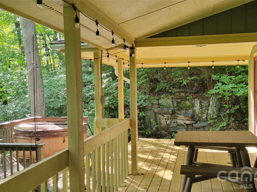 445 Allison Drive, Maggie Valley, NC 28751.  MLS# CAR4346332, YatesRealty ID 2020. Rear covered porch with open deck