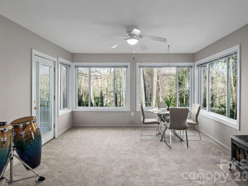125 Buffalo Trail, Asheville, NC 28805.  MLS# CAR4332345, YatesRealty ID 20200. Dining room with rear deck access