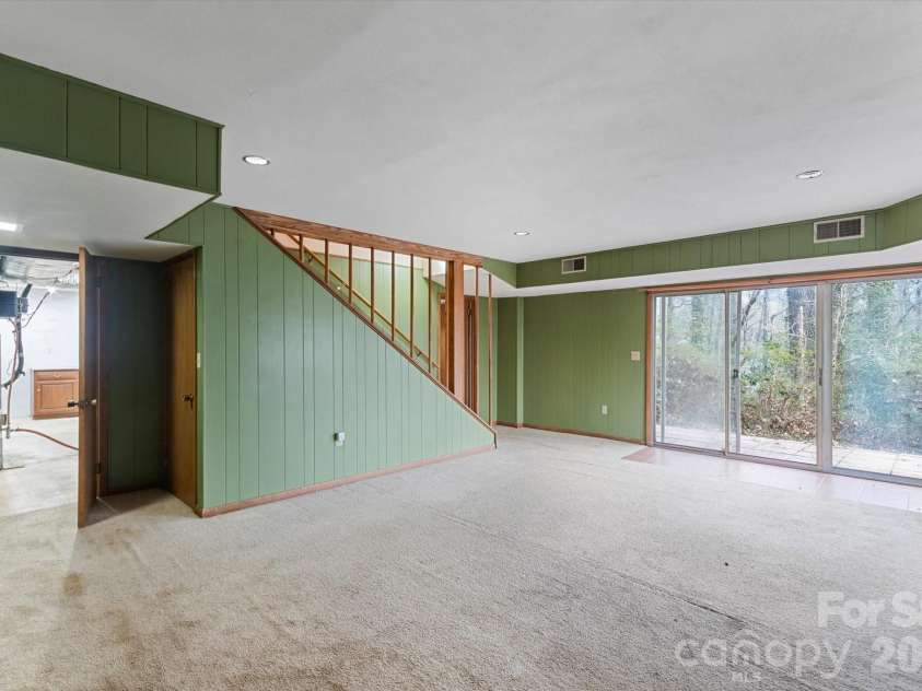277 Fairlane Road, Columbus, NC 28722.  MLS# CAR4346166, YatesRealty ID 20202. Finished basement.