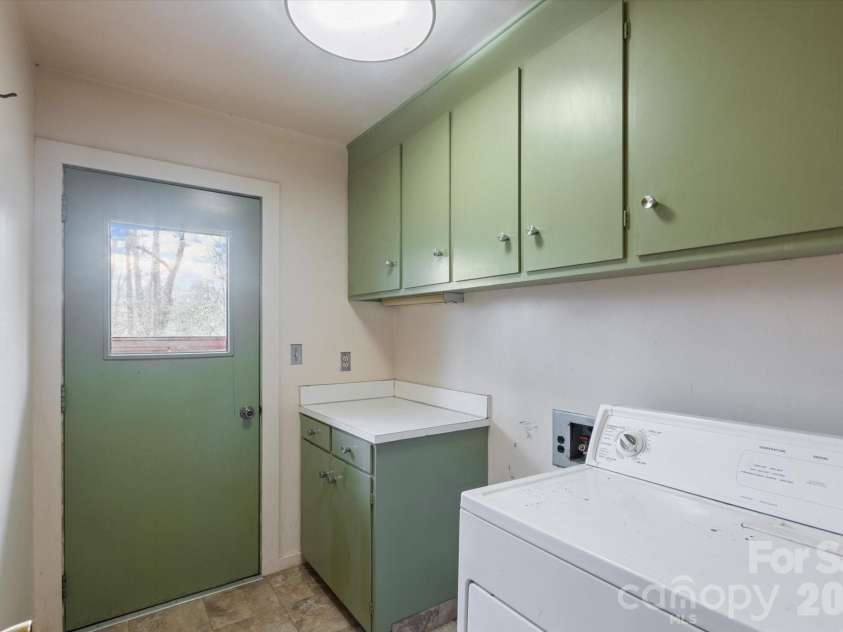 277 Fairlane Road, Columbus, NC 28722.  MLS# CAR4346166, YatesRealty ID 20202. Laundry room on main level.