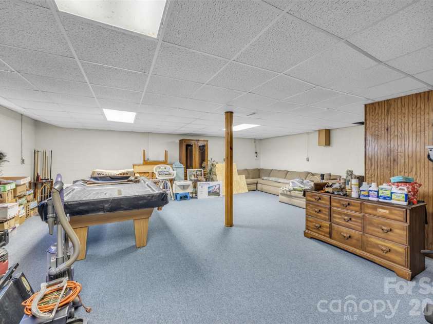 15 Mull Drive, Taylorsville, NC 28681.  MLS# CAR4333545, YatesRealty ID 2021. Finished den in basement (Ceiling height is just shy of 7')