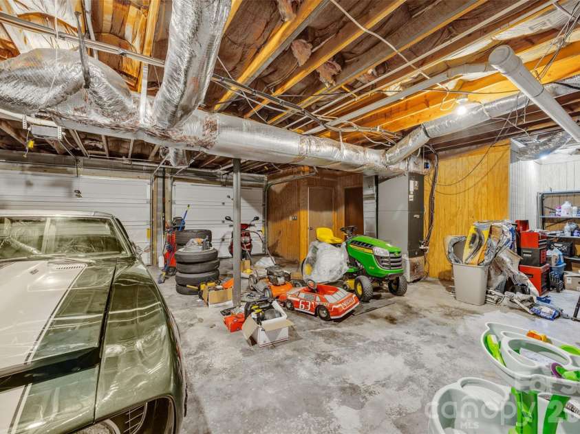 15 Mull Drive, Taylorsville, NC 28681.  MLS# CAR4333545, YatesRealty ID 2021. Garage parking in basement