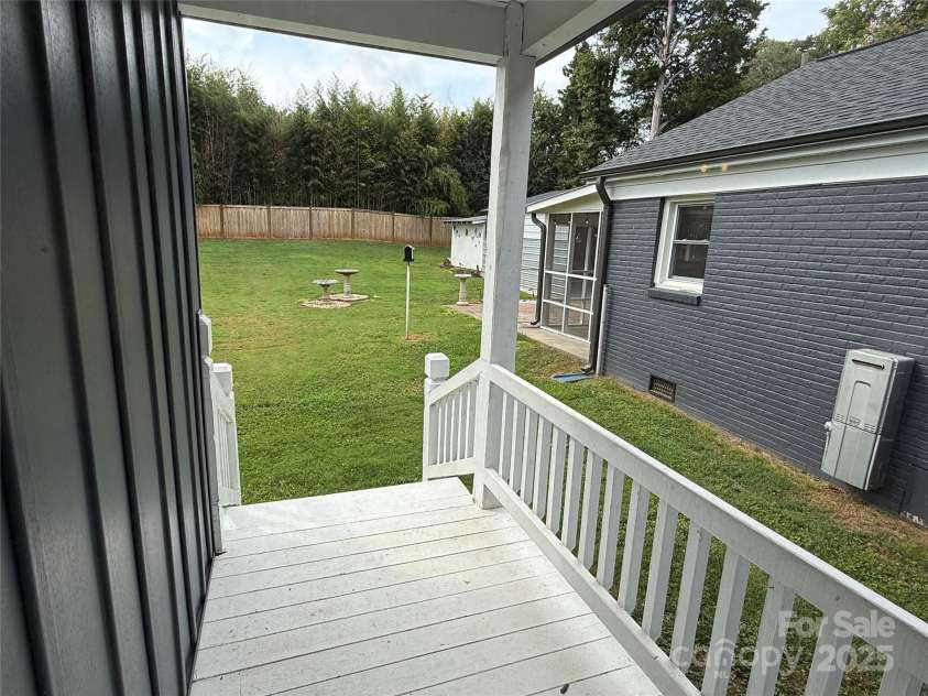 808 Mark Street, Belmont, NC 28012.  MLS# CAR4294048, YatesRealty ID 2021. Back Porch off Living Area