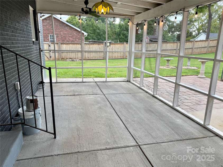 808 Mark Street, Belmont, NC 28012.  MLS# CAR4294048, YatesRealty ID 2021. Back Screened Patio Off Kitchen