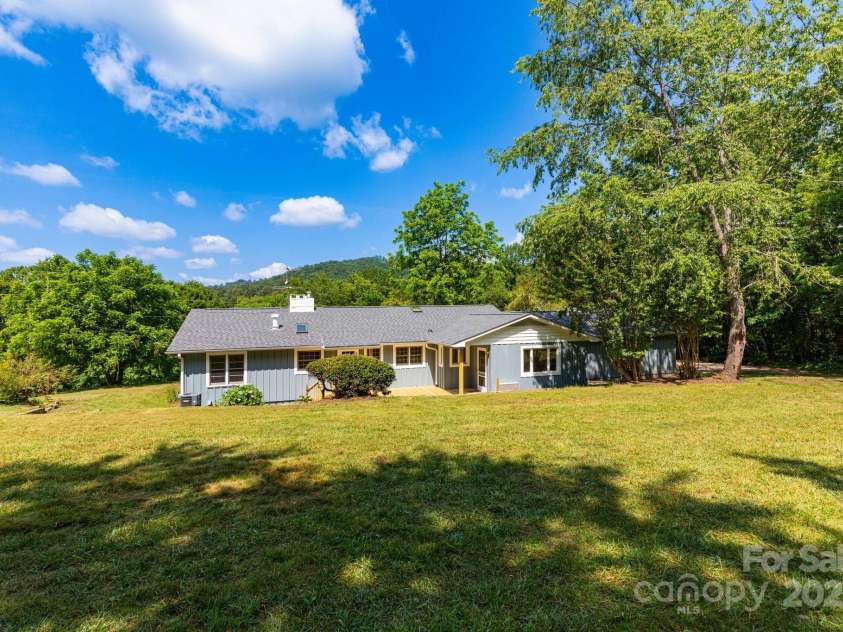 18 Gravely Branch Road, Fletcher, NC 28732.  MLS# CAR4268801, YatesRealty ID 20212. Back Yard