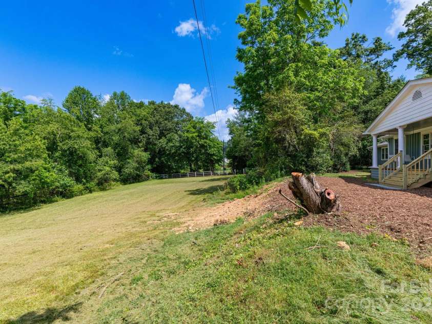 18 Gravely Branch Road, Fletcher, NC 28732.  MLS# CAR4268801, YatesRealty ID 20212. Front Yard