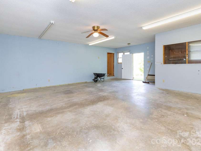 18 Gravely Branch Road, Fletcher, NC 28732.  MLS# CAR4268801, YatesRealty ID 20212. Heated Workshop - with 2 garage bays