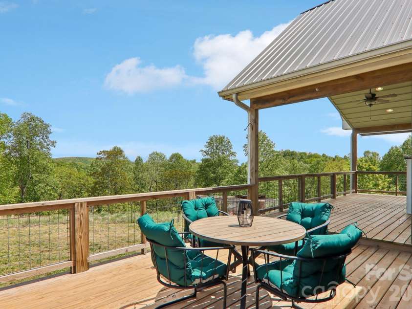 68 Simply Grateful Drive, Hendersonville, NC 28792.  MLS# CAR4361278, YatesRealty ID 20212. Beautiful views from back deck