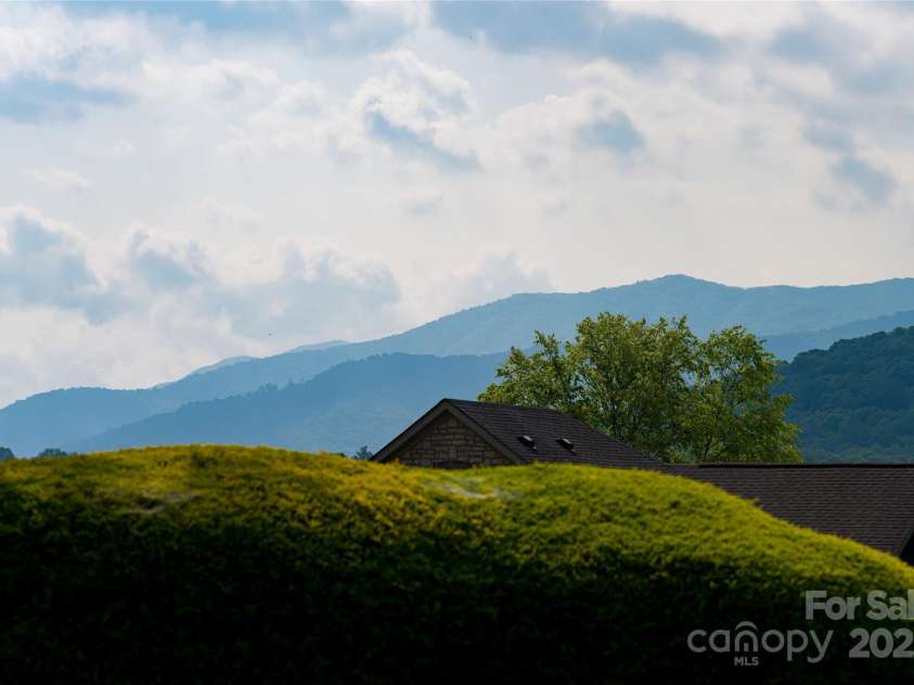 55 Outlook Circle, Swannanoa, NC 28778.  MLS# CAR4267011, YatesRealty ID 20219. Close up view of the mountains from the patio.