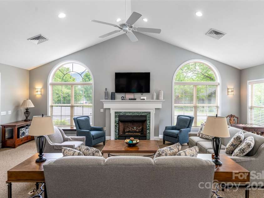 55 Outlook Circle, Swannanoa, NC 28778.  MLS# CAR4267011, YatesRealty ID 20219. Clubhouse gathering room with fireplace.