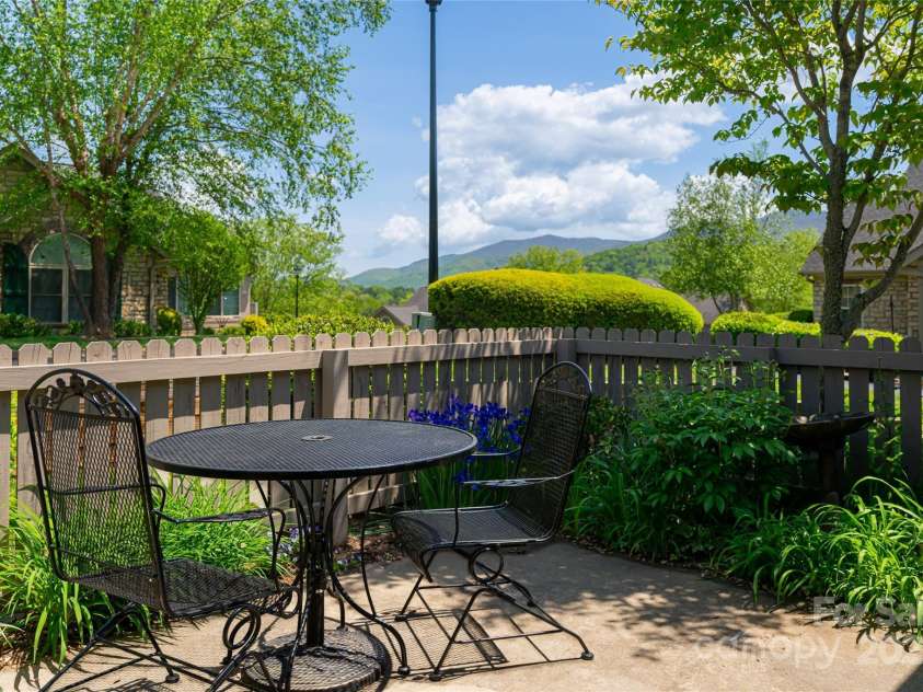 55 Outlook Circle, Swannanoa, NC 28778.  MLS# CAR4267011, YatesRealty ID 20219. Enjoy your mountain view from the outdoor patio with mature landscaping for added privacy and charm.