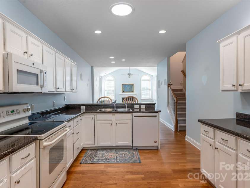 55 Outlook Circle, Swannanoa, NC 28778.  MLS# CAR4267011, YatesRealty ID 20219. Plenty of cabinets and countertops in the kitchen.