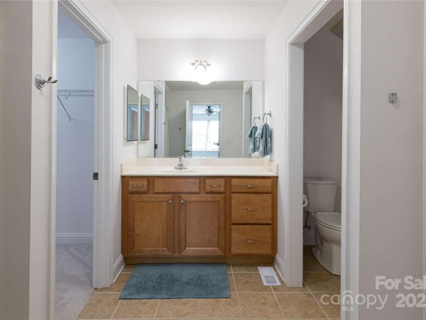 55 Outlook Circle, Swannanoa, NC 28778.  MLS# CAR4267011, YatesRealty ID 20219. Upstairs bedroom en-suite bathroom.