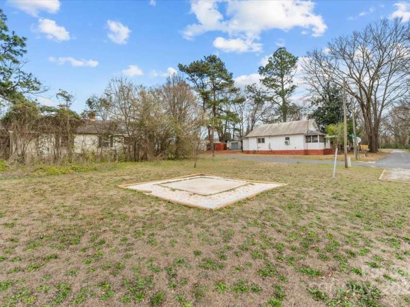 100 Lear Street, Rockingham, NC 28379.  MLS# CAR4223540, YatesRealty ID 2022. Patio area just past the parking area.