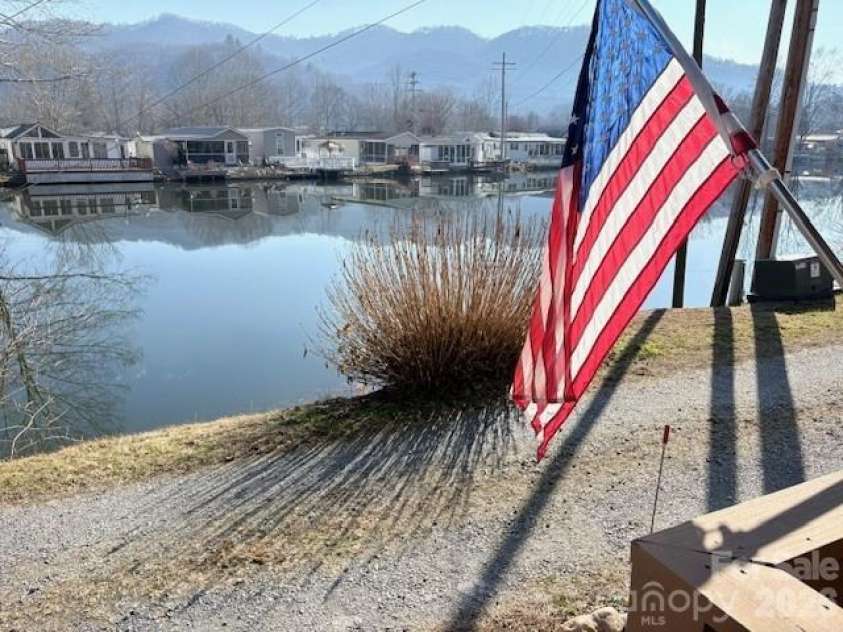 129 Mallard Loop, Waynesville, NC 28785.  MLS# CAR4335027, YatesRealty ID 2023. As seen from front corner of home