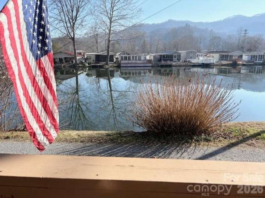 129 Mallard Loop, Waynesville, NC 28785.  MLS# CAR4335027, YatesRealty ID 2023. As seen from front porch