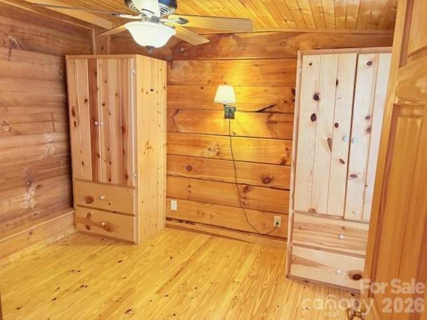 129 Mallard Loop, Waynesville, NC 28785.  MLS# CAR4335027, YatesRealty ID 2023. Back bedroom