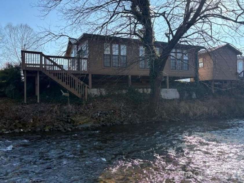 129 Mallard Loop, Waynesville, NC 28785.  MLS# CAR4335027, YatesRealty ID 2023. Back side of home