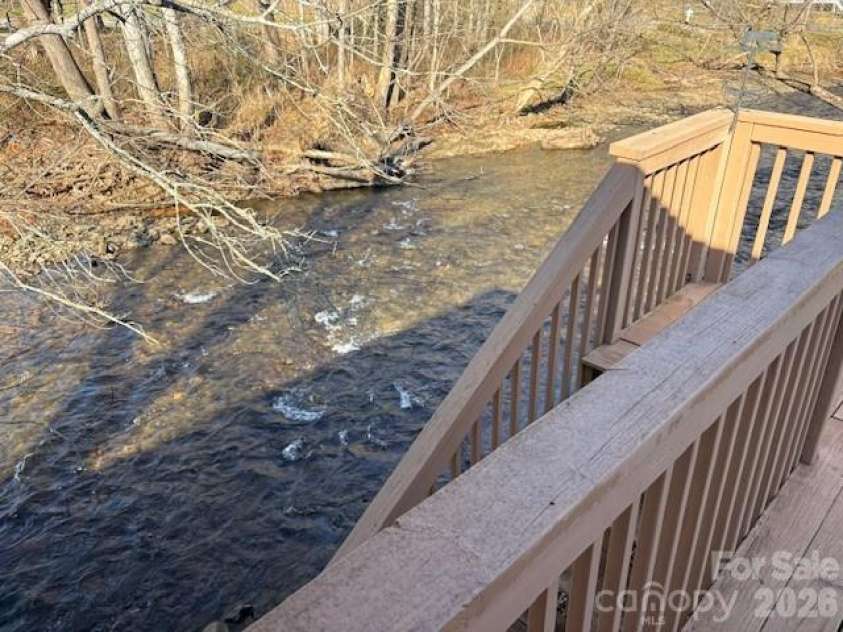 129 Mallard Loop, Waynesville, NC 28785.  MLS# CAR4335027, YatesRealty ID 2023. Creek as seen from side deck