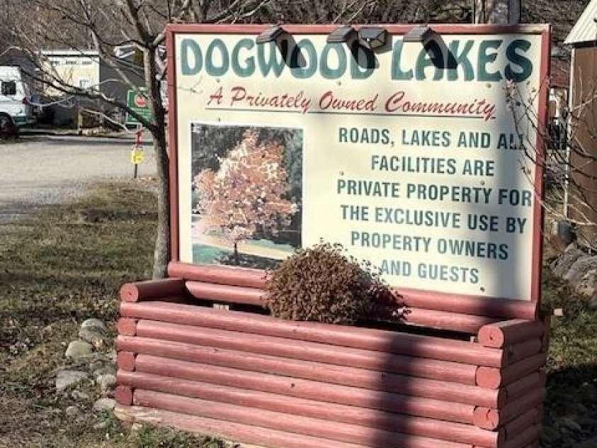 129 Mallard Loop, Waynesville, NC 28785.  MLS# CAR4335027, YatesRealty ID 2023. Dogwood Lakes entry sign