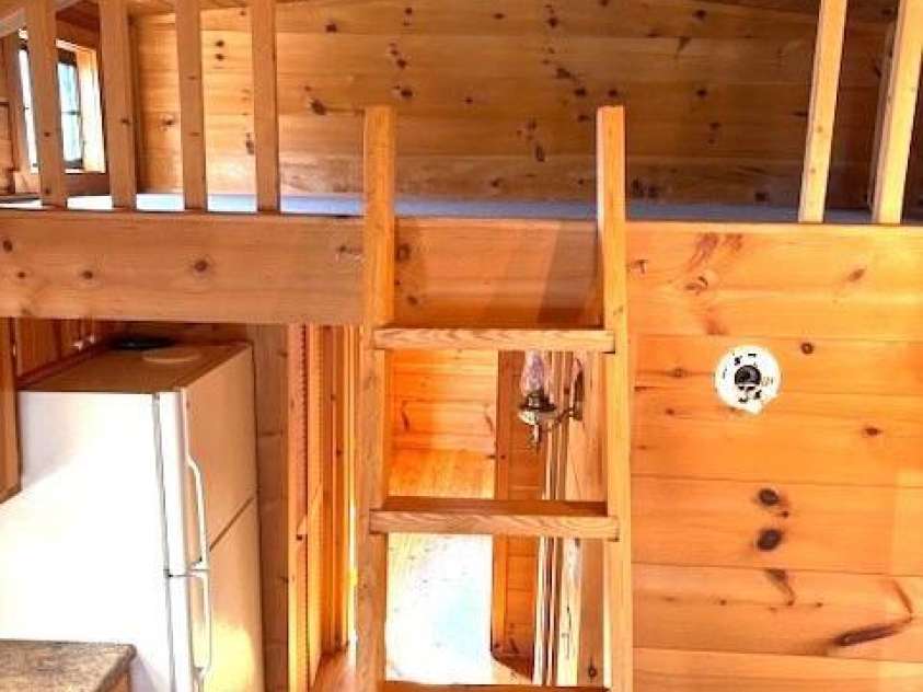 129 Mallard Loop, Waynesville, NC 28785.  MLS# CAR4335027, YatesRealty ID 2023. Loft sleeping area; climb ladder to reach