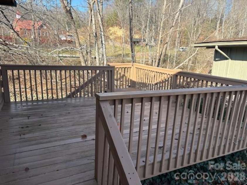 129 Mallard Loop, Waynesville, NC 28785.  MLS# CAR4335027, YatesRealty ID 2023. Open deck on right side