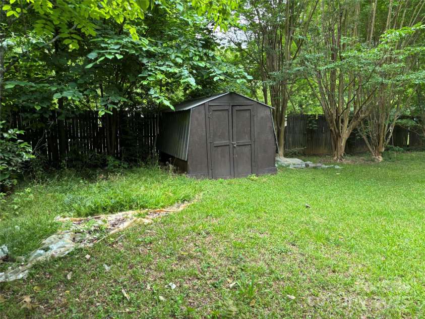 7316 Truelight Church Road, Mint Hill, NC 28227.  MLS# CAR4263547, YatesRealty ID 20233. Rear shed