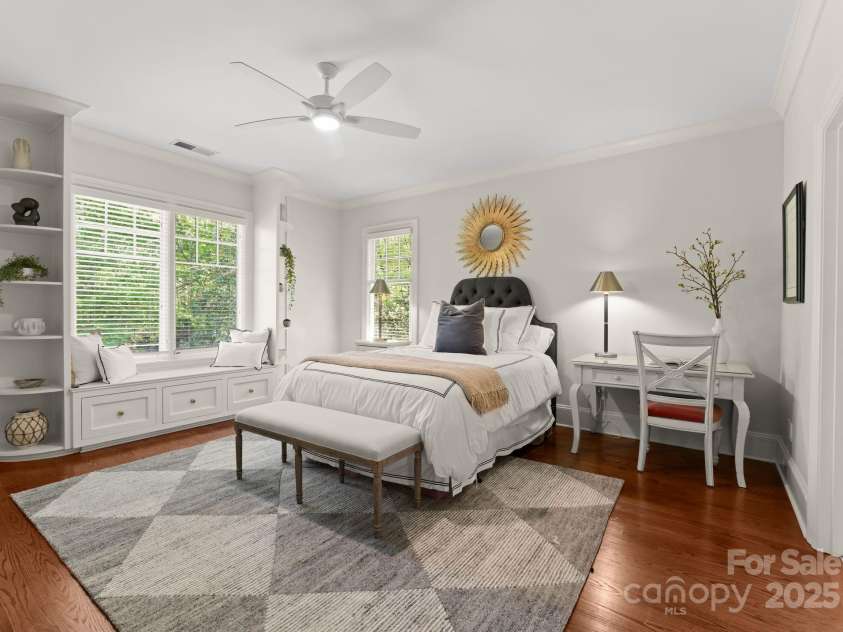 200 Highland Forest Drive, Charlotte, NC 28270.  MLS# CAR4242053, YatesRealty ID 20236. Upper level guest bedroom featuring built-in shelving and bench.