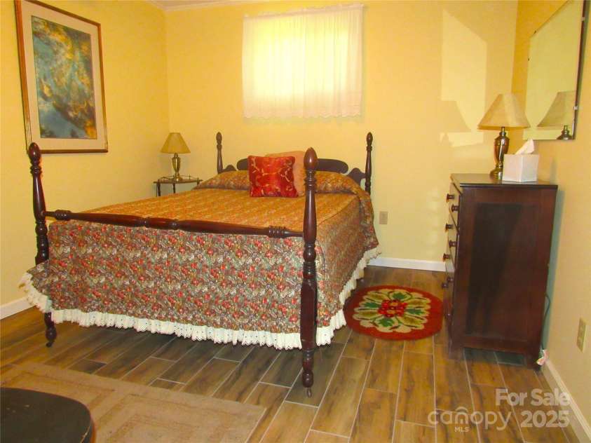 180 White Dogwood Lane, Lake Junaluska, NC 28745.  MLS# CAR4252338, YatesRealty ID 20241. Downstairs Bedroom