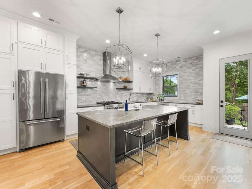 3505 Trent Street, Charlotte, NC 28209.  MLS# CAR4249257, YatesRealty ID 20245. Wide island with bar seating