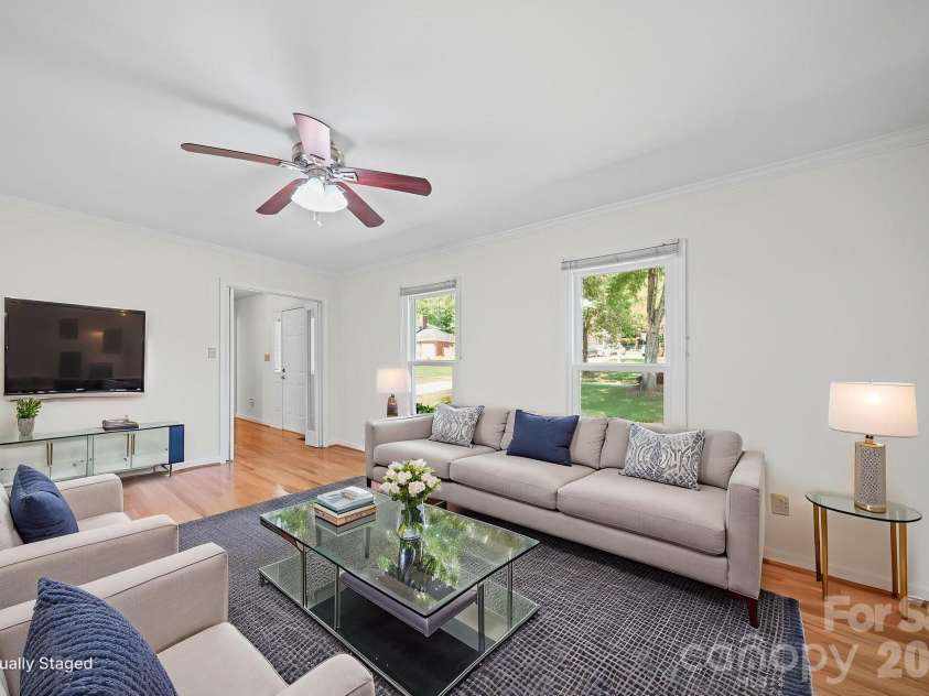 6520 Dougherty Drive, Charlotte, NC 28213.  MLS# CAR4377449, YatesRealty ID 20248. Family room (virtually staged)
