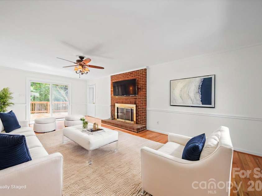 6520 Dougherty Drive, Charlotte, NC 28213.  MLS# CAR4377449, YatesRealty ID 20248. Living room (virtually staged)